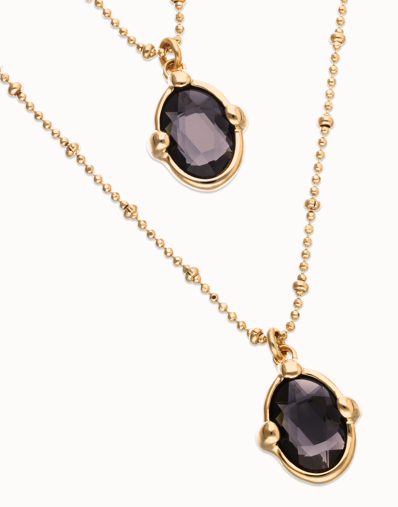 Collar doble bañado en oro 18k con dos cristales facetados ovalados negros, Dorado, large thumbnail